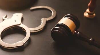 handcuffs and judge's gavel in court - Understanding Ohio Drug Laws