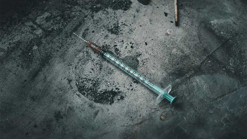 dirty needle on the sidewalk - Tranq Dope & The Dangers Of Xylazine In Ohio