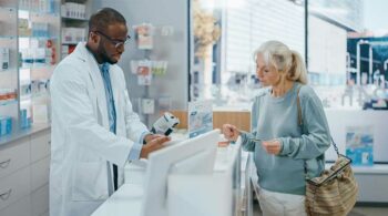 Pharmacist Talking To Customer-Understanding Opioid Prescribing Guidelines In Ohio