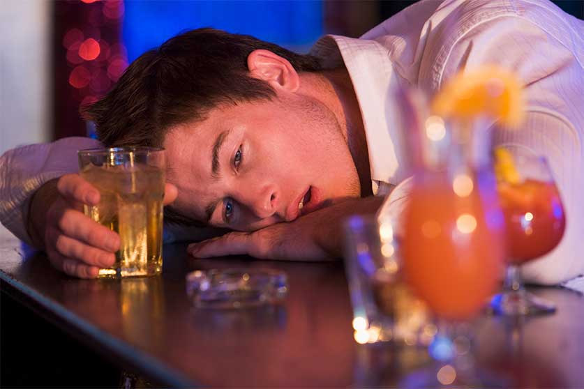Man Drunk At A Bar-Binge Drinking Vs. Alcoholism | What's The Difference?
